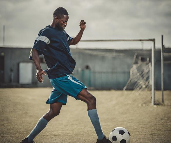 man playing football